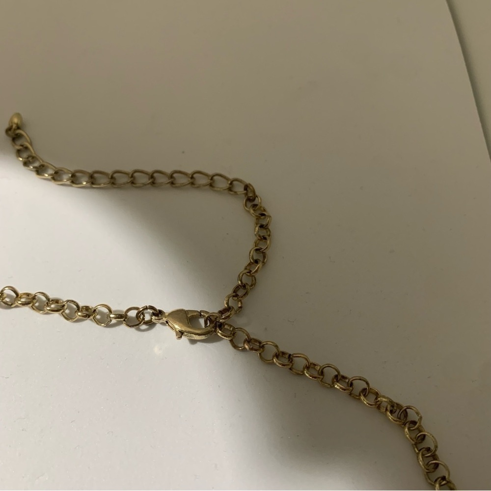 Oversized faux pearl and gold toned necklace. - Picture 3 of 4